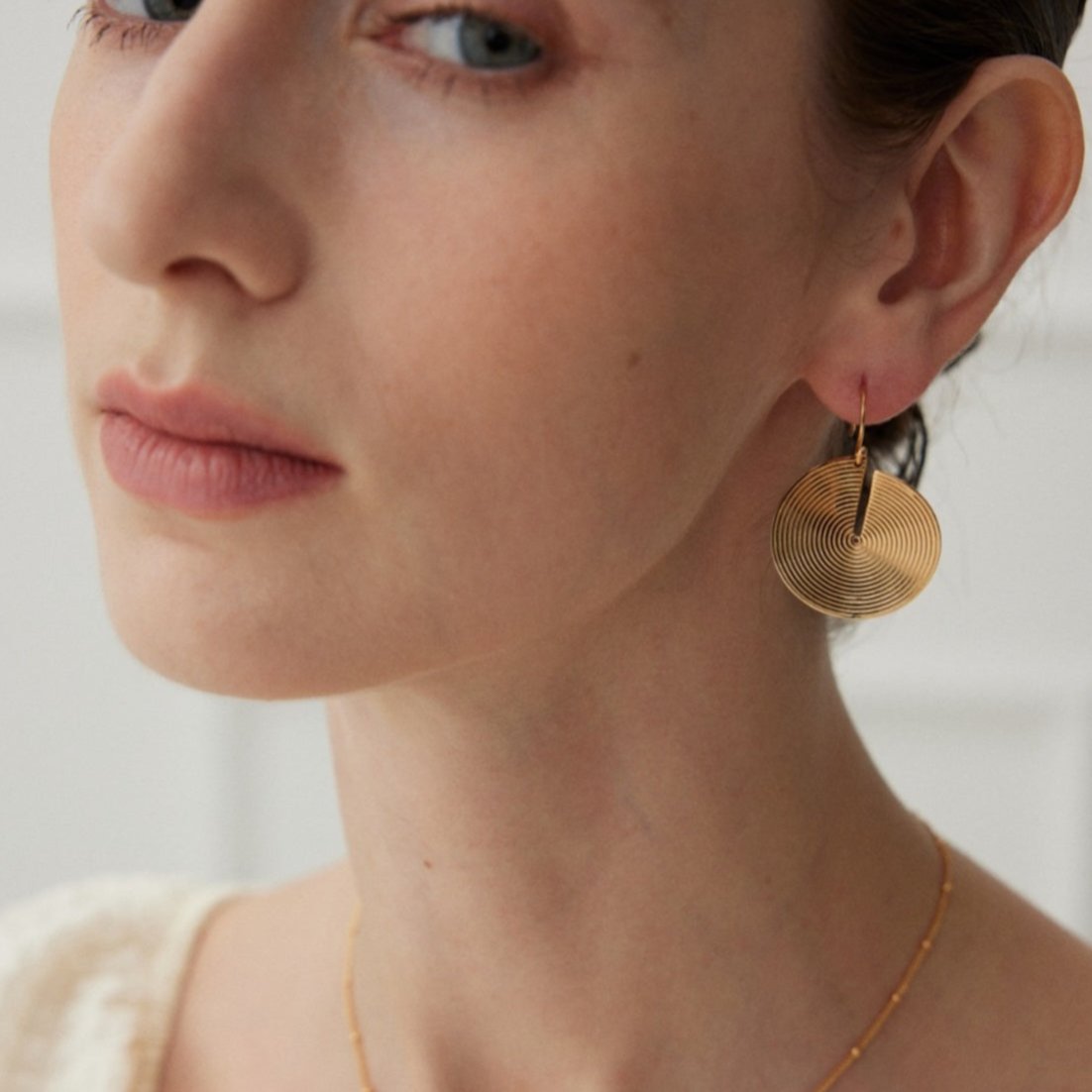 18K Gold on Silver Spiral Disc Drop Earrings - model shot