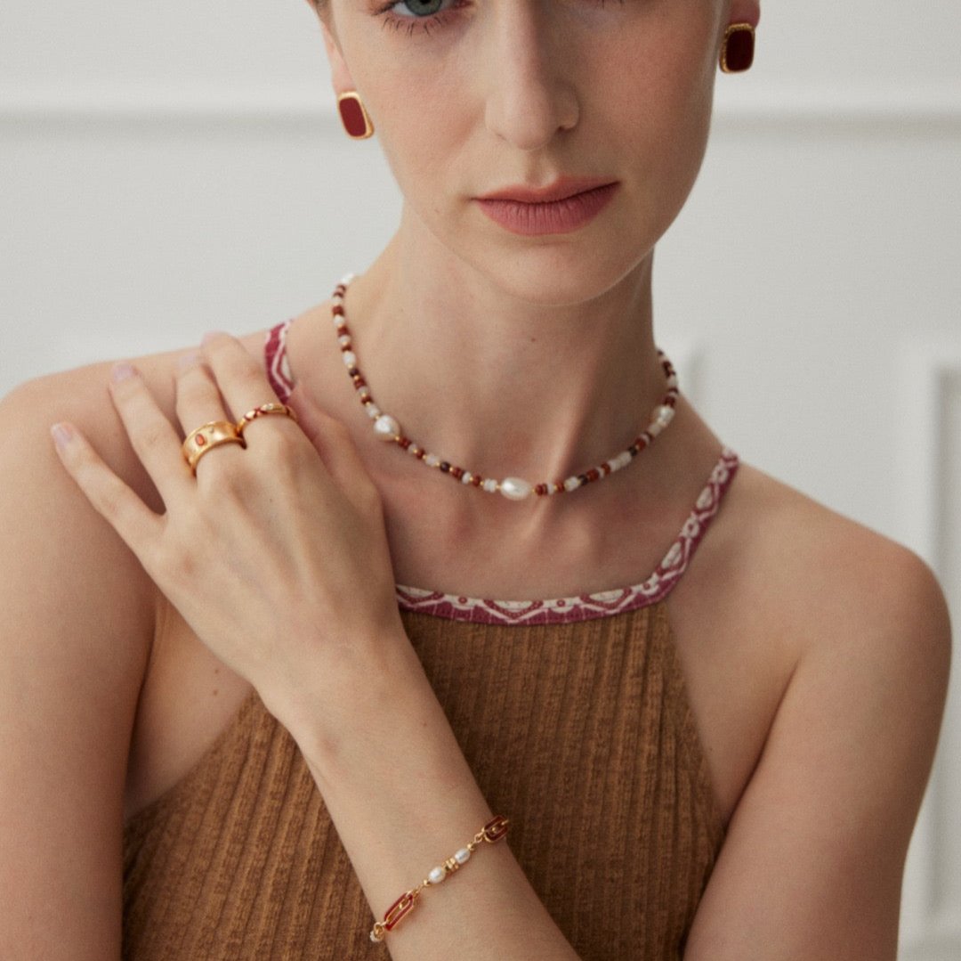 Red Thread of Fate Vermeil Cuff Ring - model shot with matching set of jewelry